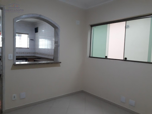 Espaço da sala para a cozinha