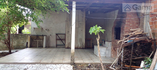 Àrea externa com churrasqueira