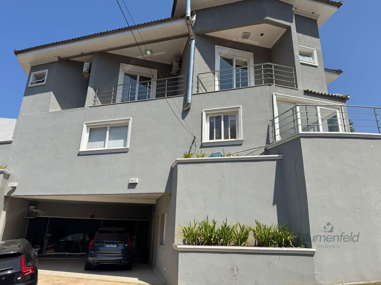 Casa à venda com 4 quartos, 5 banheiros, 3 vagas e 344m² no Condomínio Real Park, Arujá — foto principal