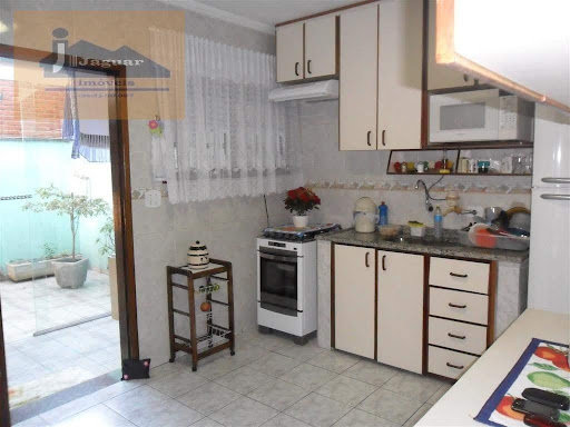Casa à Venda em Jardim Cocaia, Guarulhos: 2 Suítes, 92m²