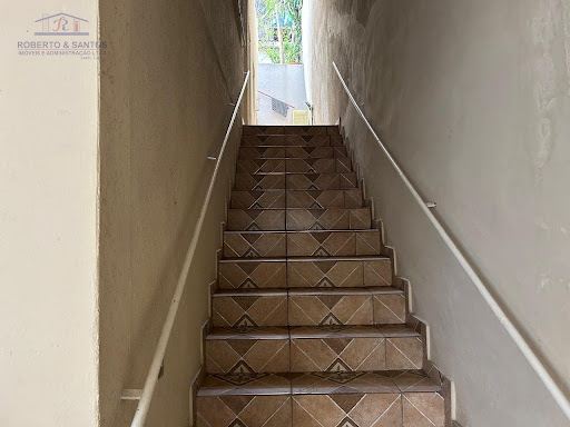 Escadas  de acesso as casasde cima
