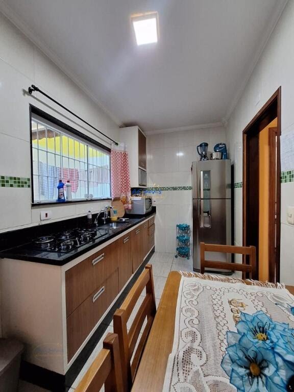 Casa à venda com 2 quartos, 1 suíte, 2 vagas e 70m² no Vila Assuncao, Praia Grande (SP) — foto 9 de 29