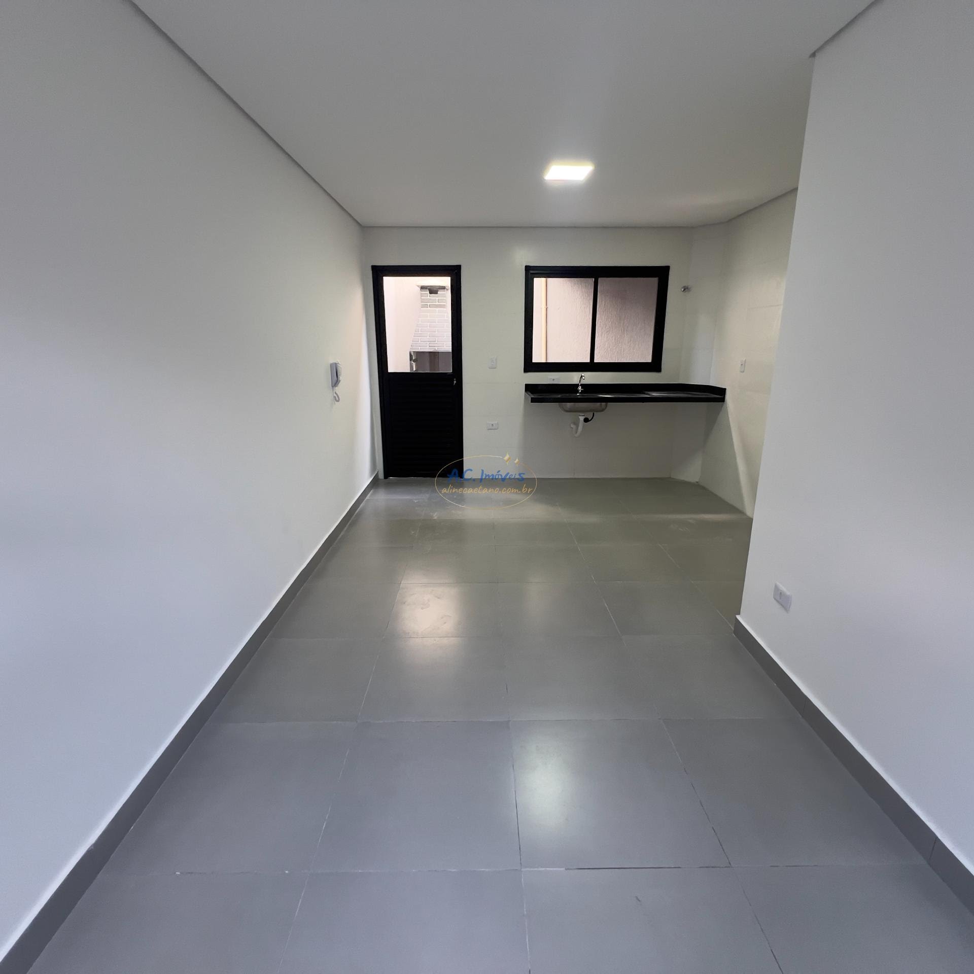 Casa à venda com 2 quartos, 2 banheiros, 1 vaga e 55m² no Jardim Imperador, Praia Grande (SP) — foto 3 de 18