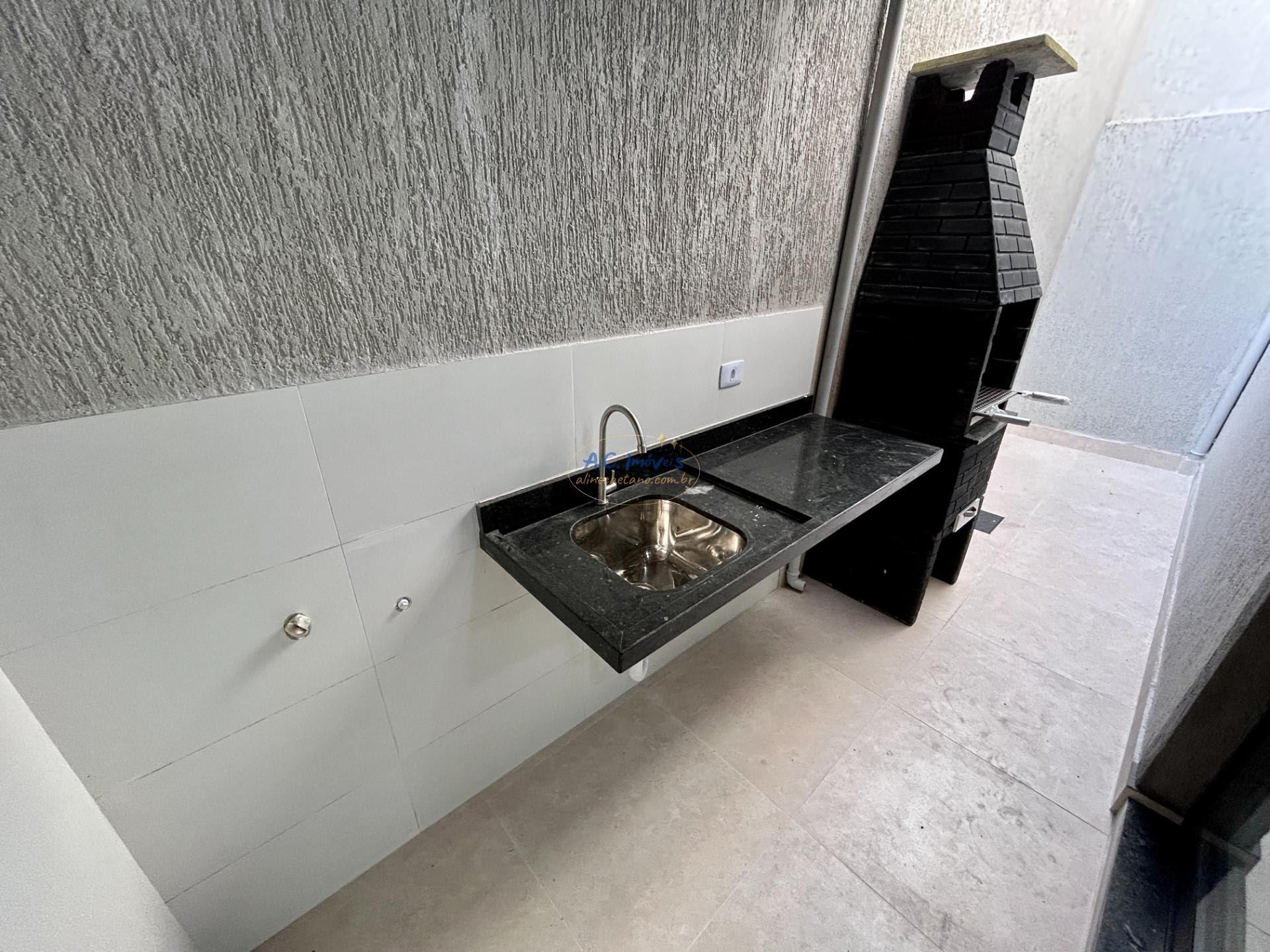 Casa à venda com 2 quartos, 2 suítes, 1 vaga e 60m² no Jardim Melvi, Praia Grande (SP) — foto 13 de 30
