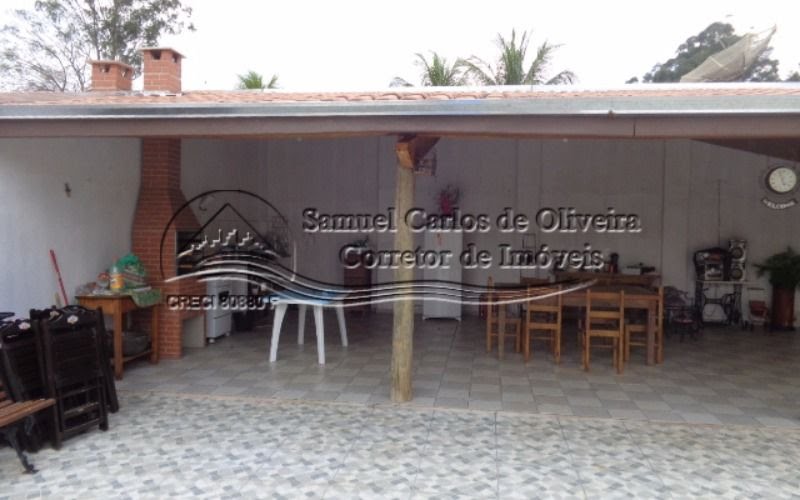 Casa com edícula