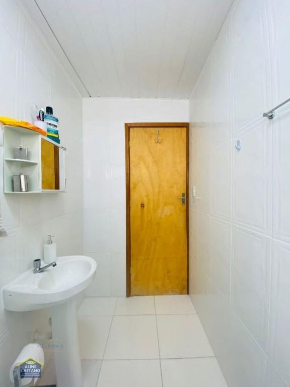 Casa à venda com 3 quartos, 1 suíte, 3 vagas e 150m² no Tupi, Praia Grande (SP) — foto 11 de 30