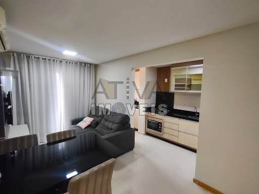 Sala estar social e cozinha