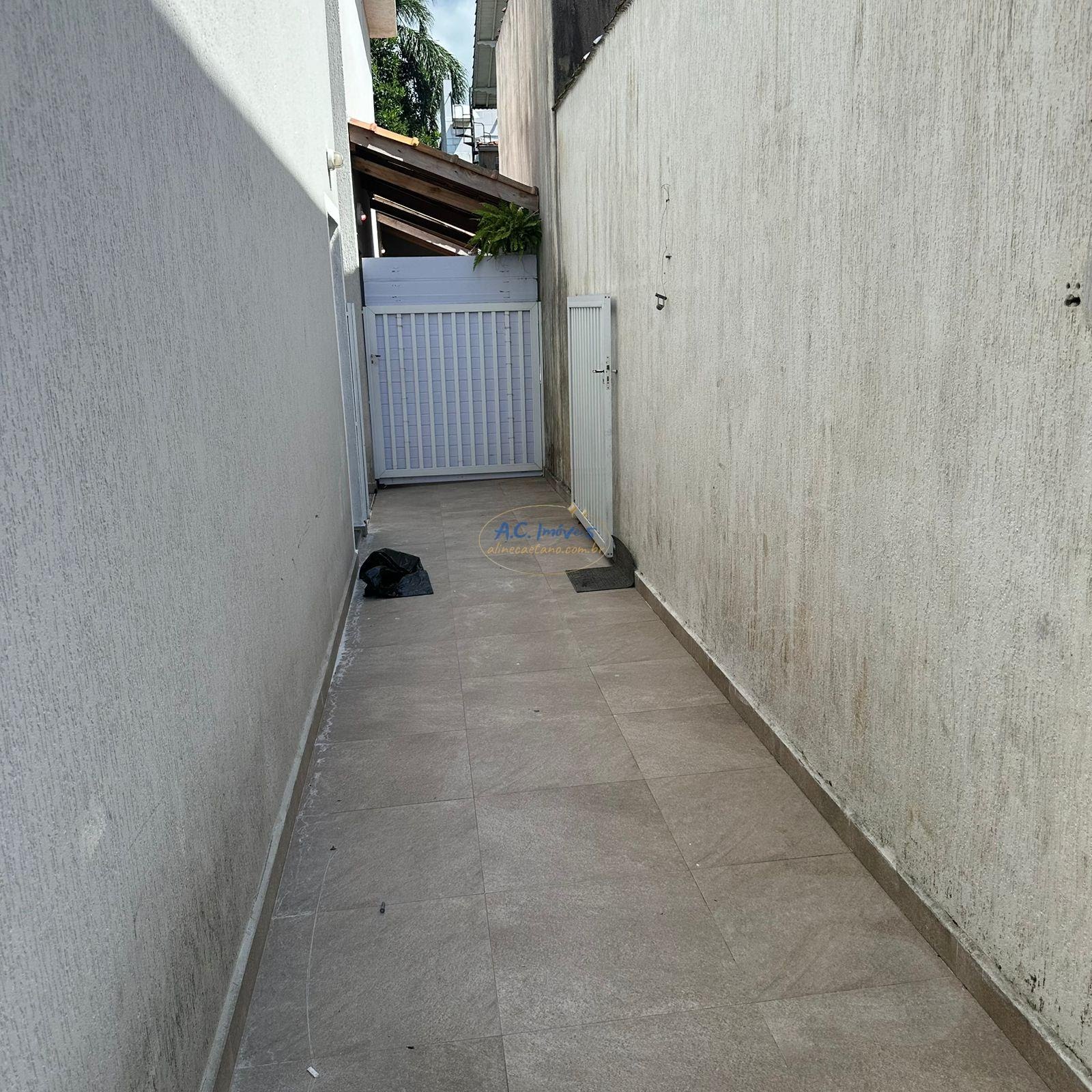 Casa à venda com 2 quartos, 2 banheiros, 1 vaga e 61m² no Jardim Melvi, Praia Grande (SP) — foto 15 de 17