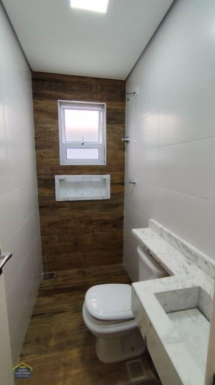 Casa à venda com 3 quartos, 2 suítes, 2 vagas e 110m² no Vila Tupi, Praia Grande (SP) — foto 14 de 30