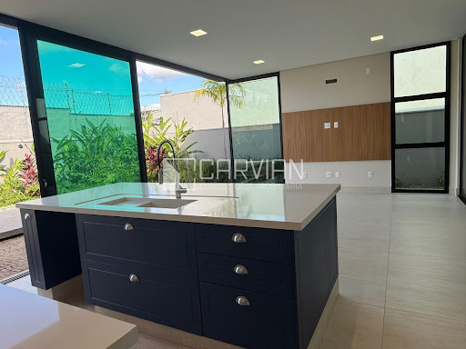 Cozinha com Área de lazer. Painel para Tv