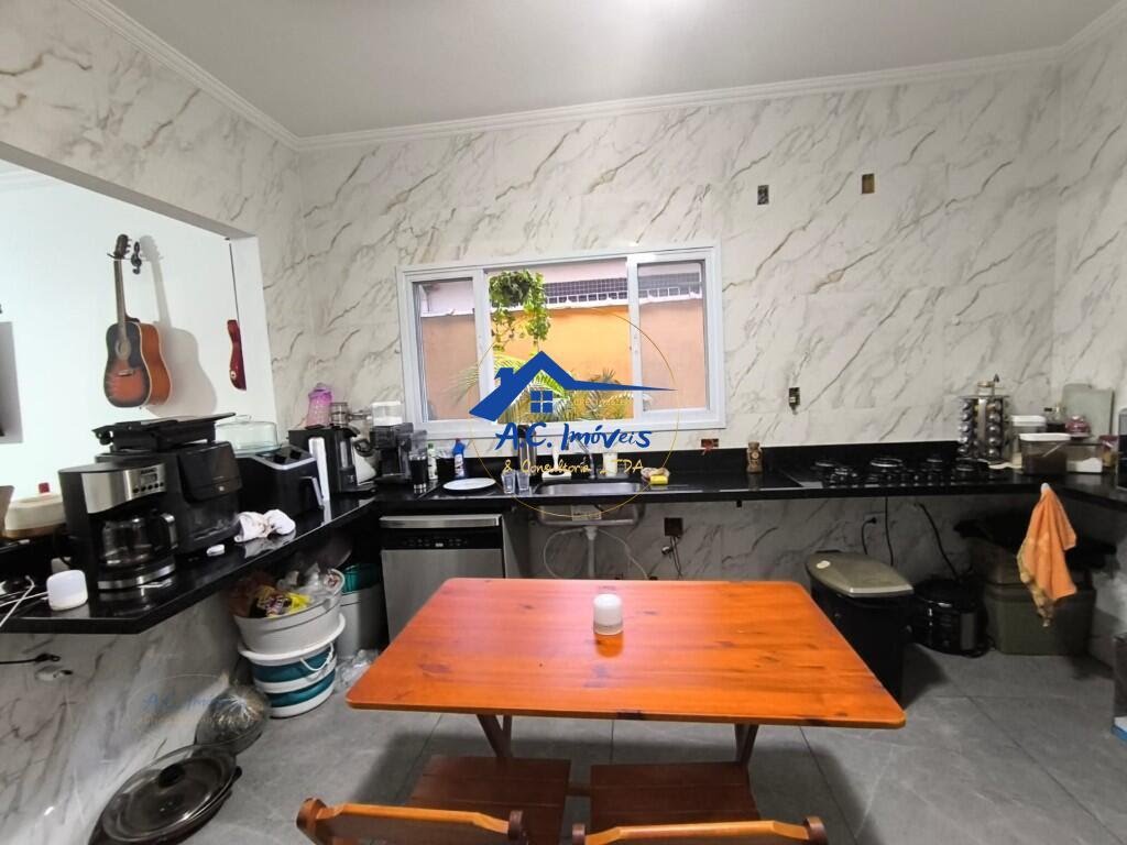 Casa à venda com 2 quartos, 1 suíte, 2 vagas e 109m² no Guilhermina, Praia Grande (SP) — foto 9 de 28