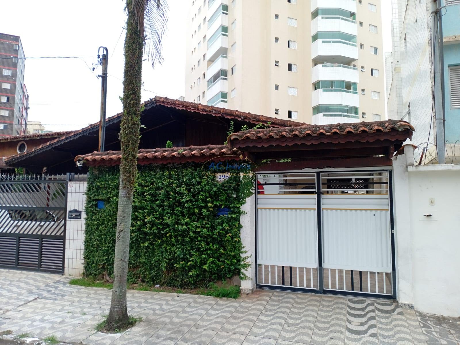 Casa à venda com 3 quartos, 1 suíte, 2 vagas e 107m² no Vila Tupi, Praia Grande (SP) — foto 2 de 24
