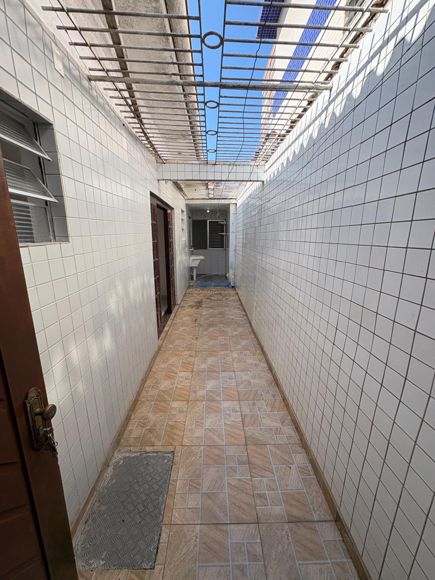Casa à venda com 1 quarto, 1 banheiro, 2 vagas e 62m² no Guilhermina, Praia Grande (SP) — foto 18 de 26