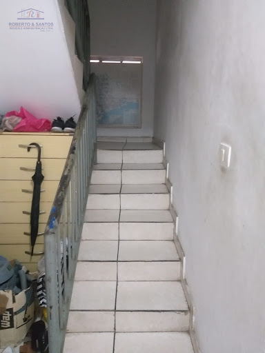 Escada de acesso aos quartos 
