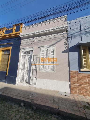 Casa no Centro de Pelotas para locação, 55,1m², 1 dormitório e Pátio por R$ 1.200.
