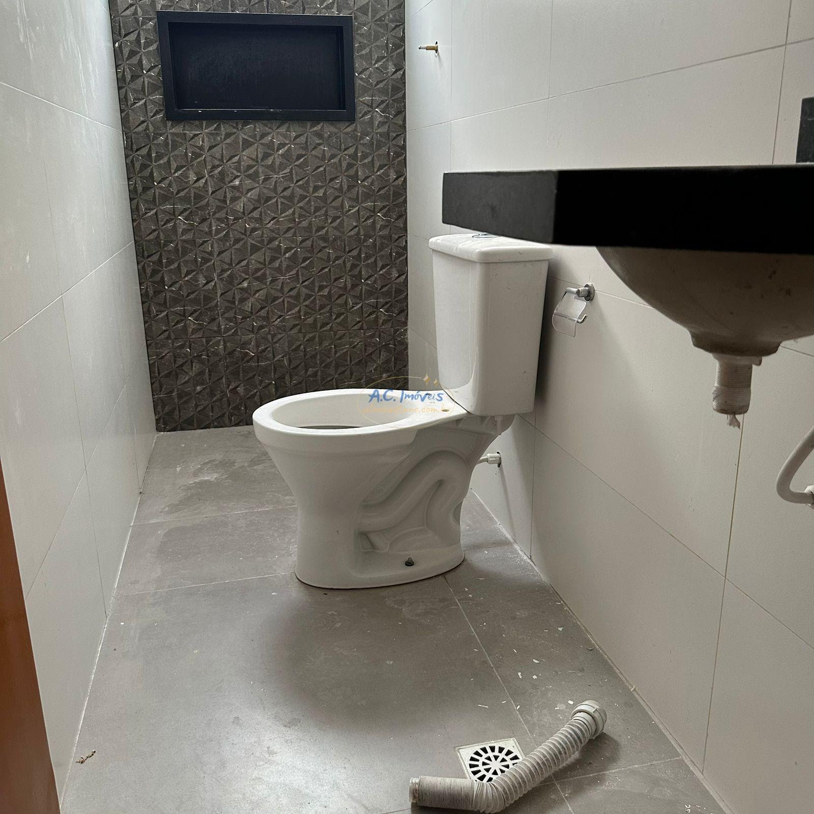 Casa à venda com 2 quartos, 2 banheiros, 1 vaga e 61m² no Jardim Melvi, Praia Grande (SP) — foto 14 de 17