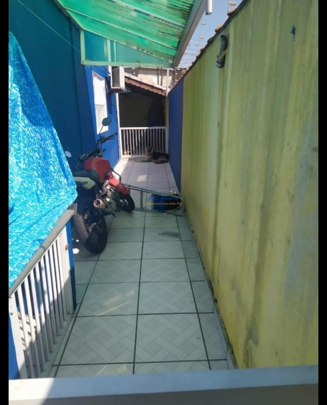 Casa à venda com 3 quartos, 1 suíte, 2 vagas e 90m² no Vila Tupi, Praia Grande (SP) — foto 17 de 21