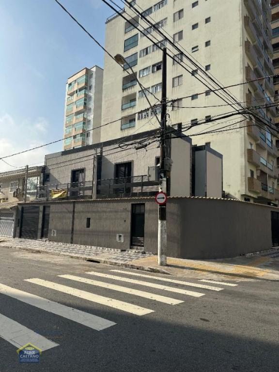 Casa à venda com 3 quartos, 1 suíte, 2 vagas e 111m² no Vila Tupi, Praia Grande (SP) — foto 19 de 19
