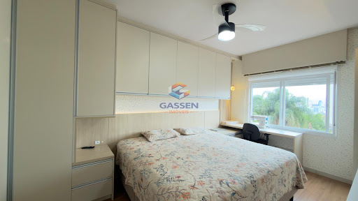 Dormitório de apartamento semimobiliado reformado em Santa Cruz do Sul