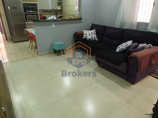 Sala de visitas integrada a cozinha