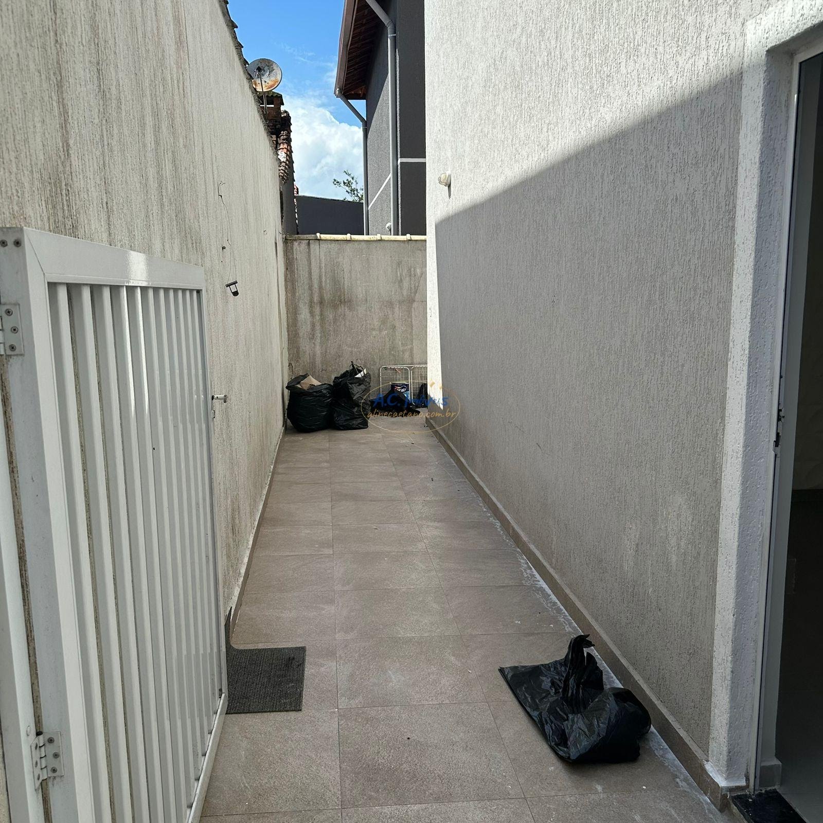 Casa à venda com 2 quartos, 2 banheiros, 1 vaga e 61m² no Jardim Melvi, Praia Grande (SP) — foto 14 de 17