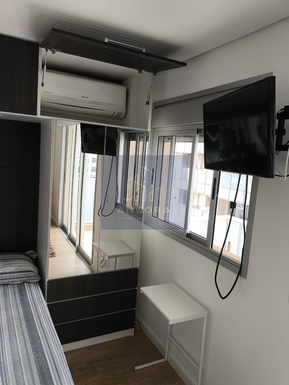 Ar condicionado e tv 