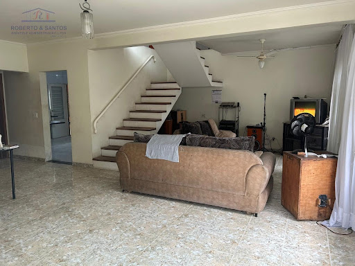 Sala de estar e visitaCozinha