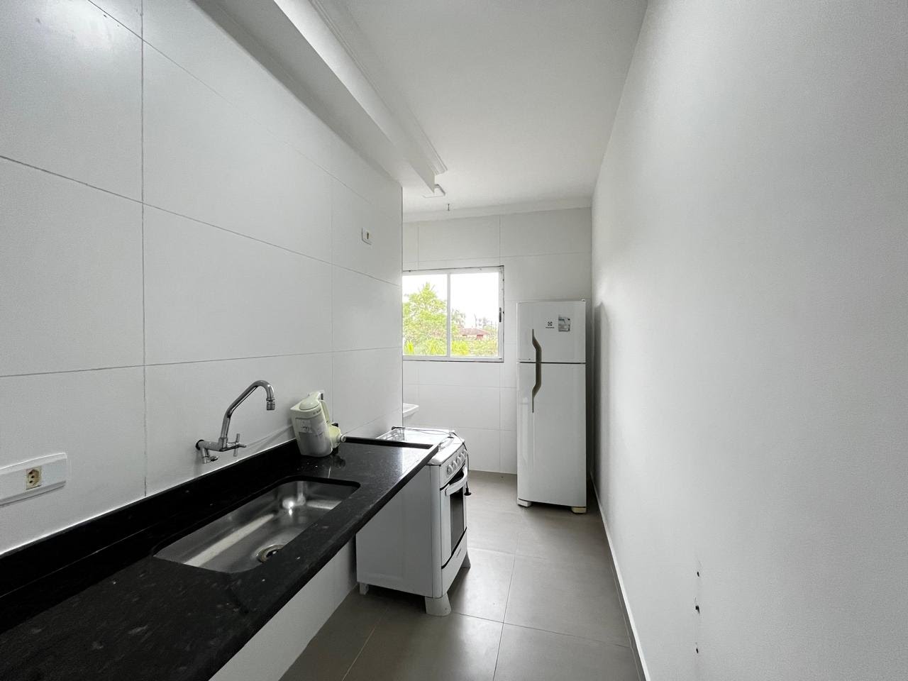 Apartamento à venda com 2 quartos, 1 banheiro, 1 vaga e 60m² no Itaguá, Ubatuba (SP) — foto 2 de 7