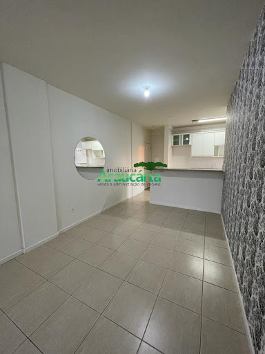 Sala ampla em conceito aberto