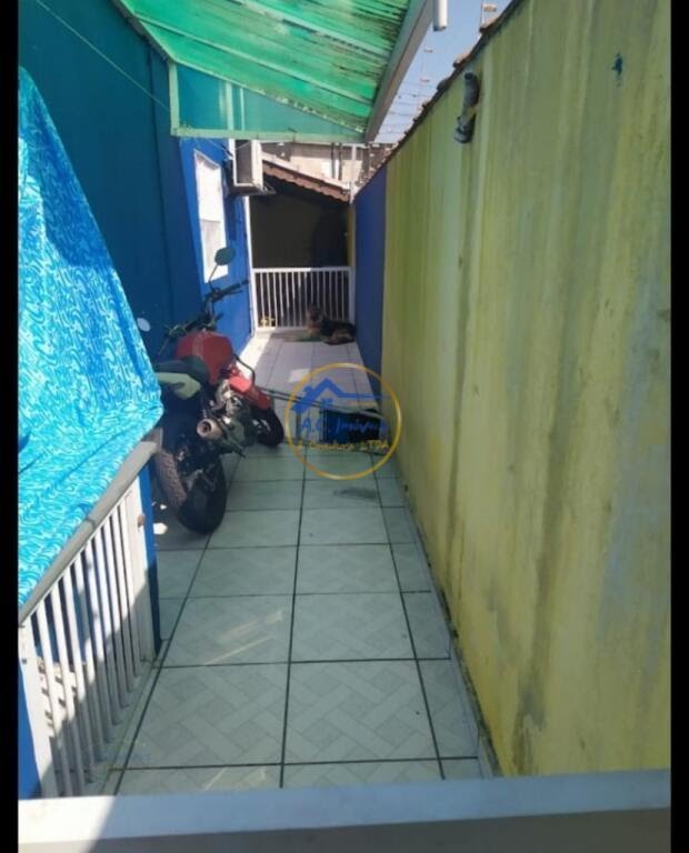 Casa à venda com 3 quartos, 1 suíte, 2 vagas e 90m² no Vila Tupi, Praia Grande (SP) — foto 16 de 21