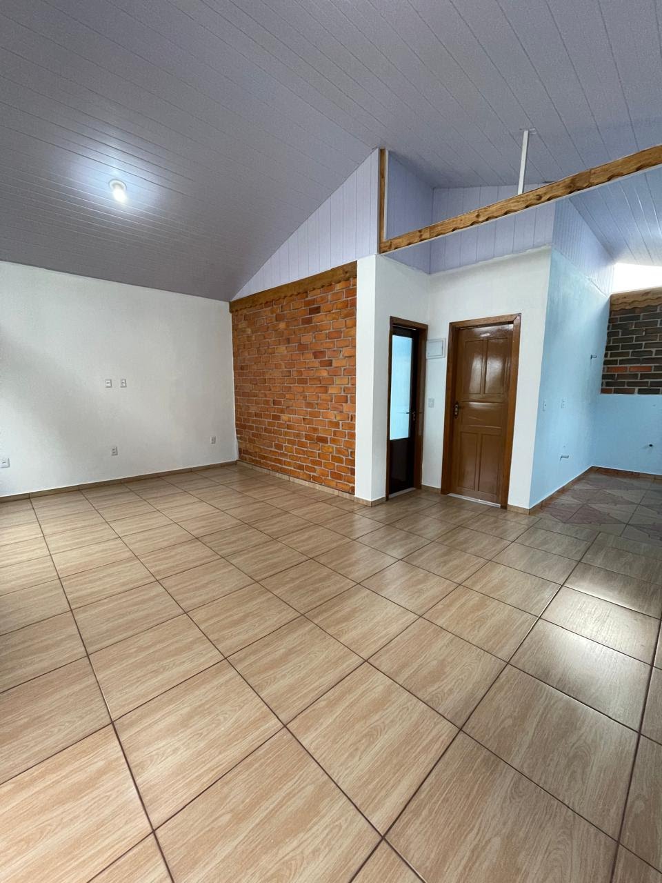 Sala e cozinha em conceito aberto
