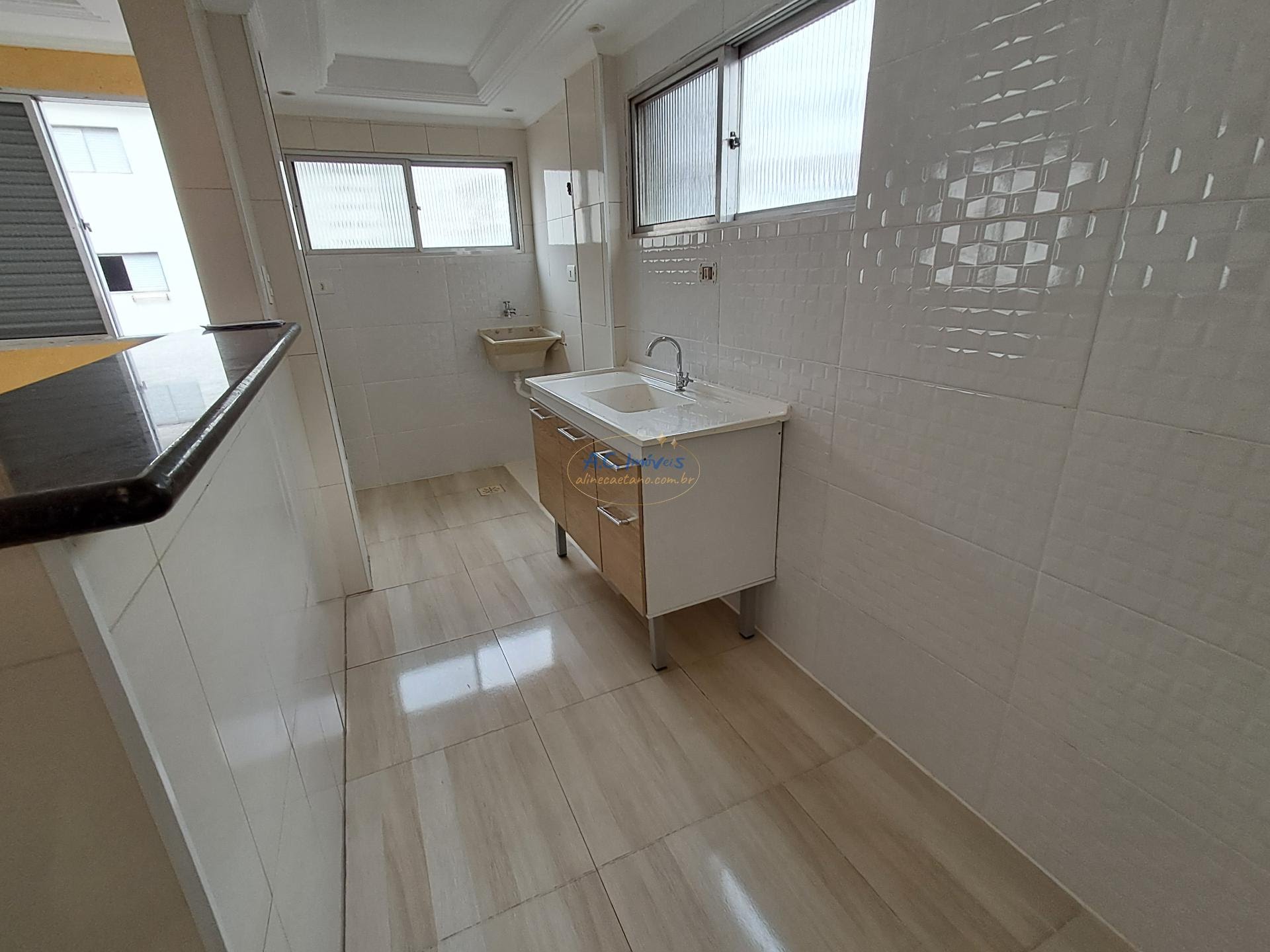 Apartamento à venda com 2 quartos, 1 suíte, 1 vaga e 50m² no Guilhermina, Praia Grande (SP) — foto 4 de 13
