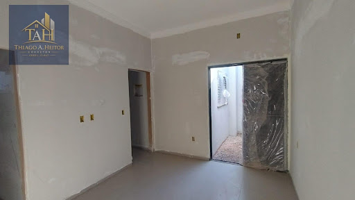 Quarto casal com área de luiz