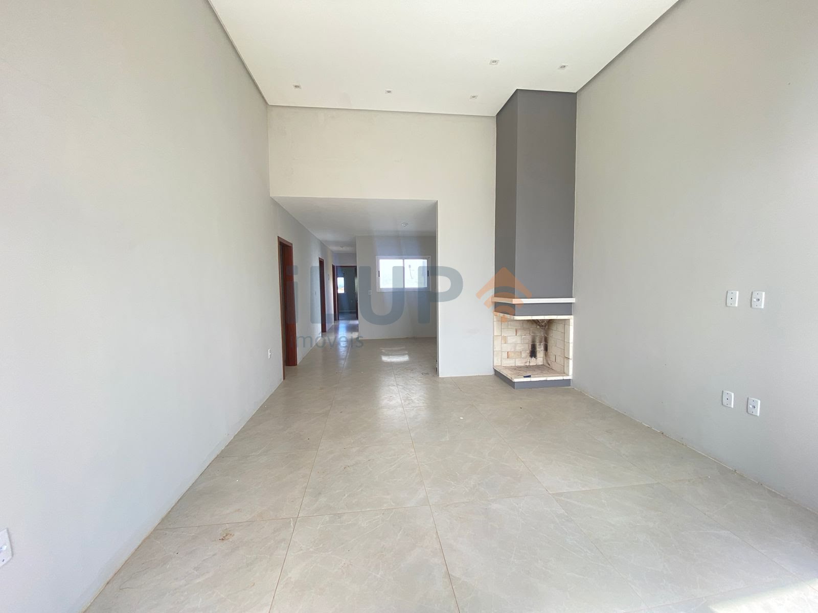Sala de estar e cozinha integradas