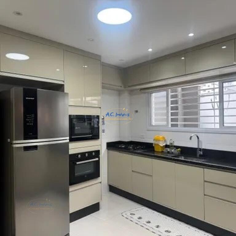 Casa à venda com 3 quartos, 1 suíte, 2 vagas e 105m² no Guilhermina, Praia Grande (SP) — foto 18 de 30