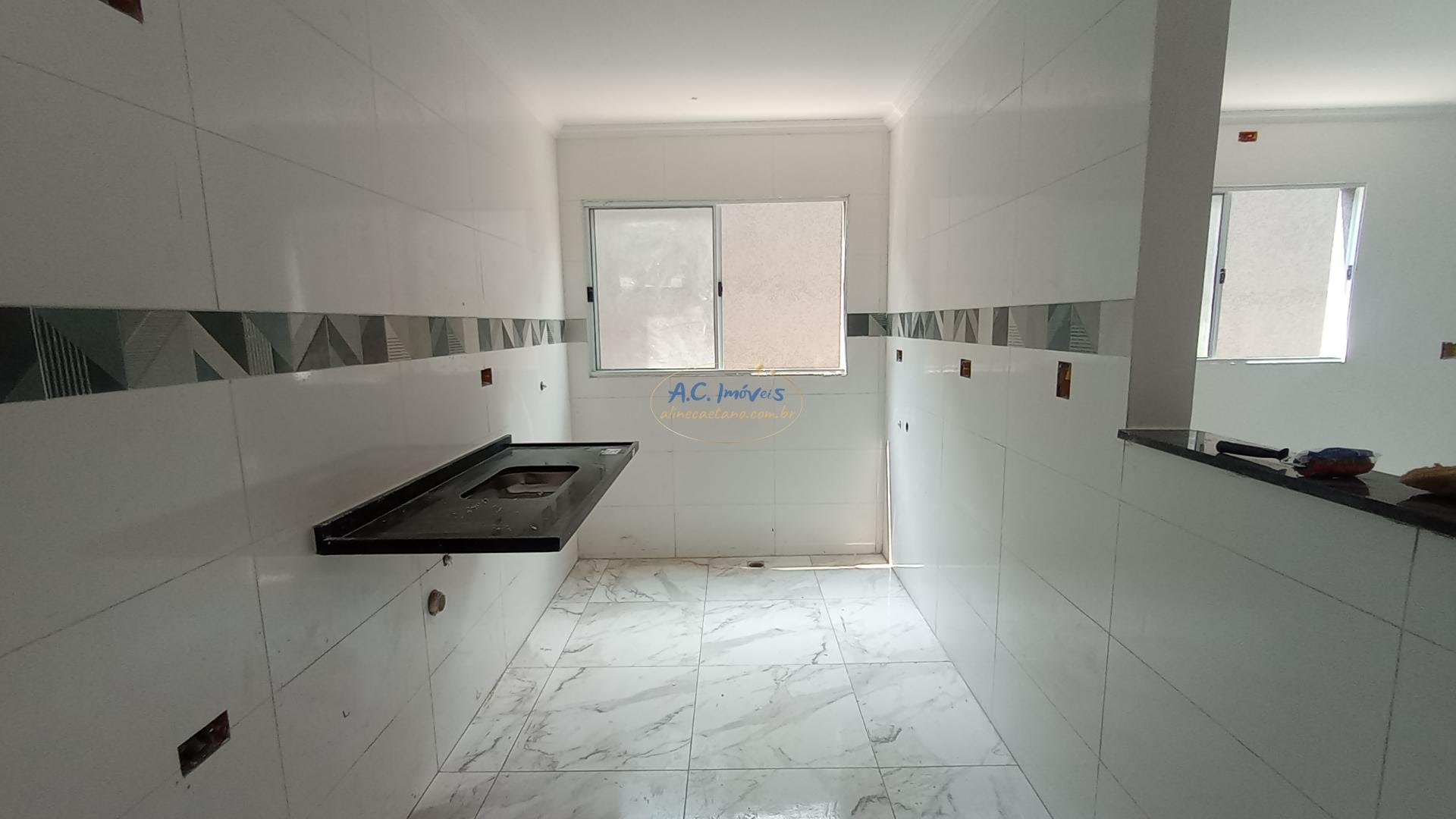 Casa à venda com 2 quartos, 2 banheiros, 1 vaga e 68m² no Sítio do Campo, Praia Grande (SP) — foto 12 de 27