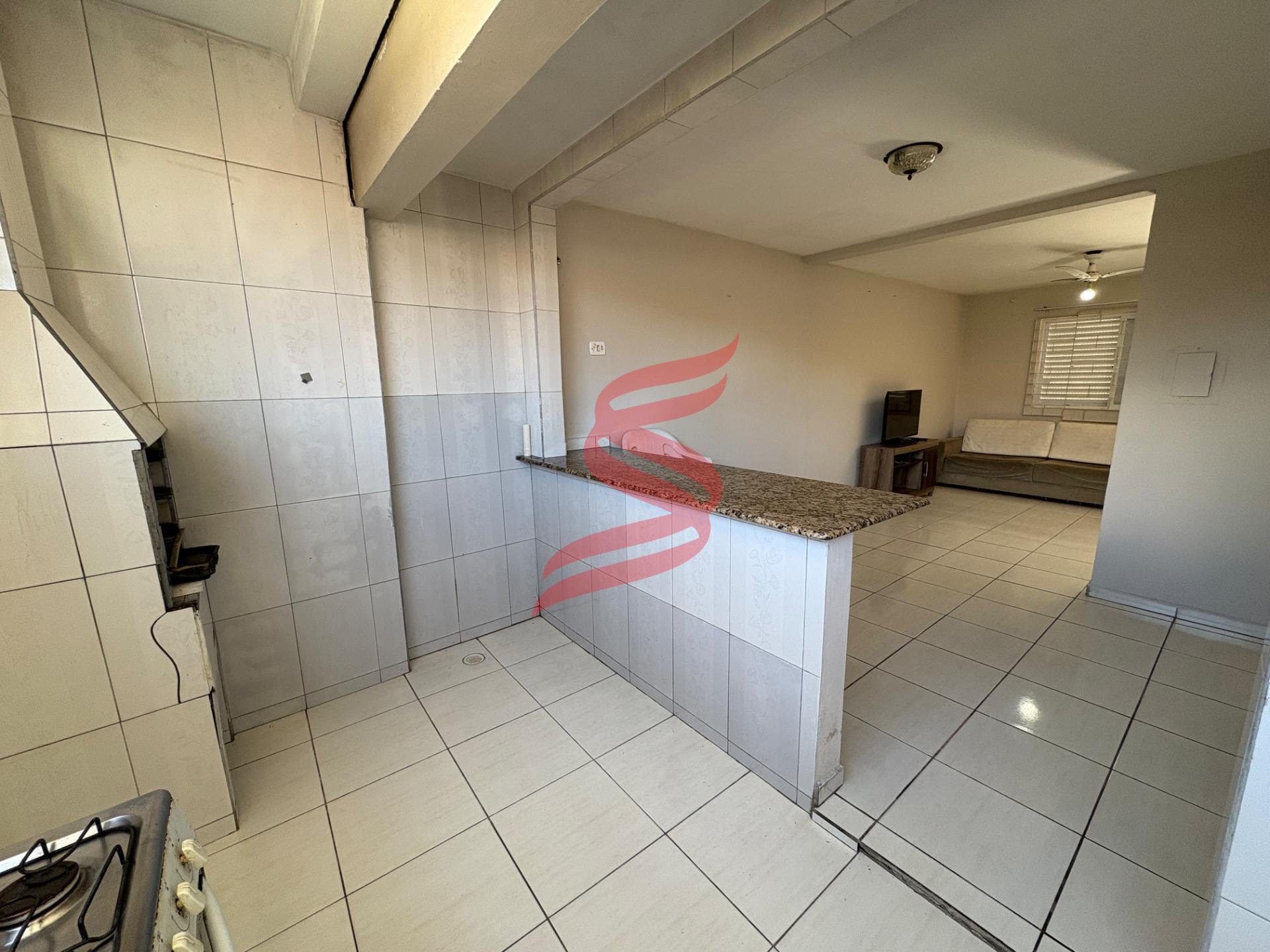 Vista da cozinha para sala