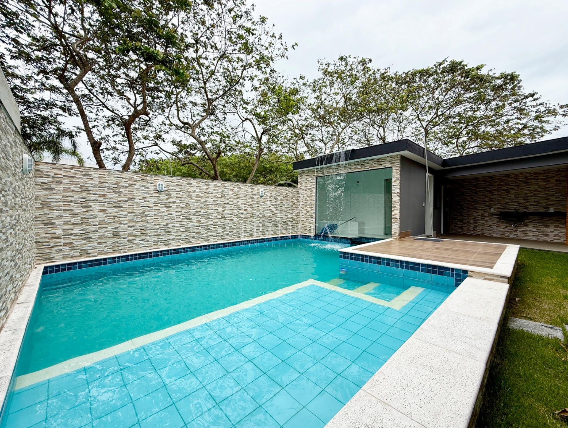 Piscina da casa à venda no condomínio Riviera Del Sol
