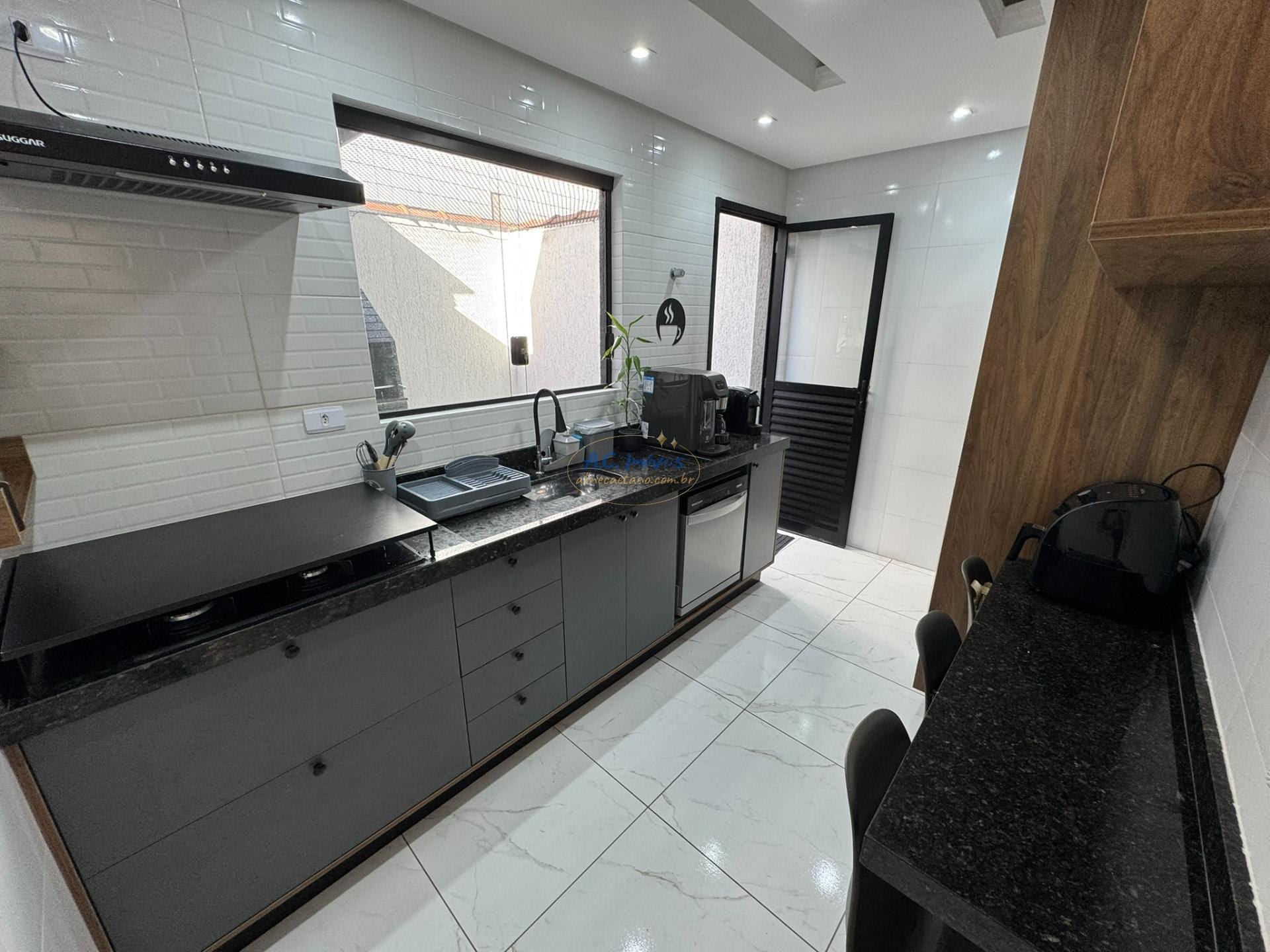 Casa à venda com 2 quartos, 2 banheiros, 1 vaga e 60m² no Vila Tupi, Praia Grande (SP) — foto 28 de 30
