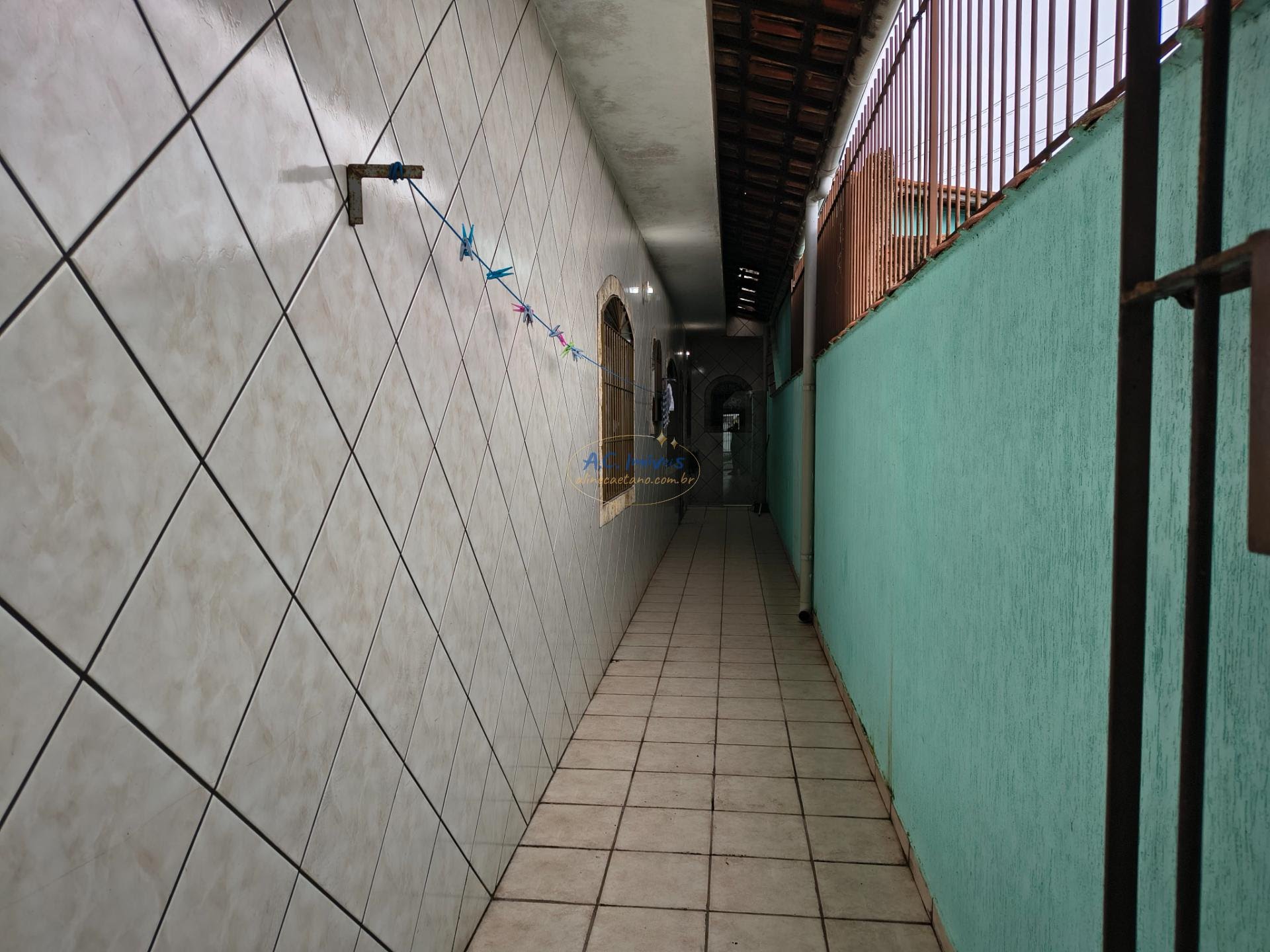 Casa à venda com 2 quartos, 2 banheiros, 2 vagas e 70m² no Jardim Imperador, Praia Grande (SP) — foto 10 de 11