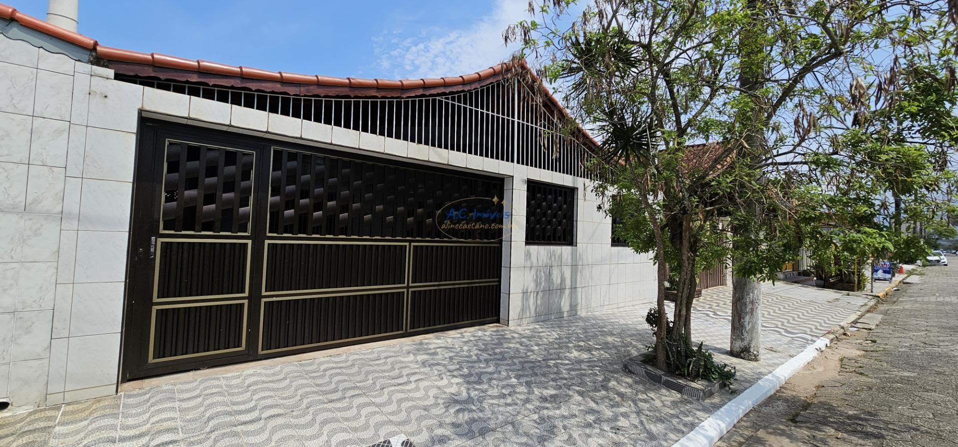 Casa à venda com 2 quartos, 1 suíte, 4 vagas e 65m² no Maracanã, Praia Grande (SP) — foto 2 de 30