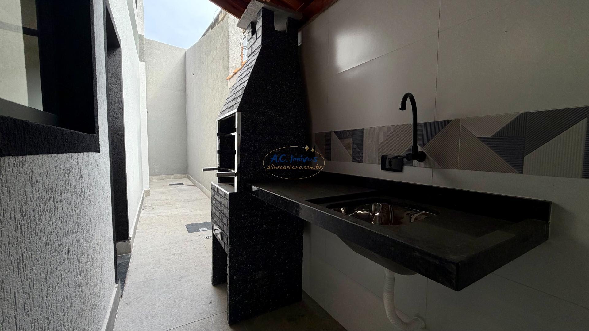 Casa à venda com 2 quartos, 2 banheiros, 1 vaga e 64m² no Guilhermina, Praia Grande (SP) — foto 12 de 13