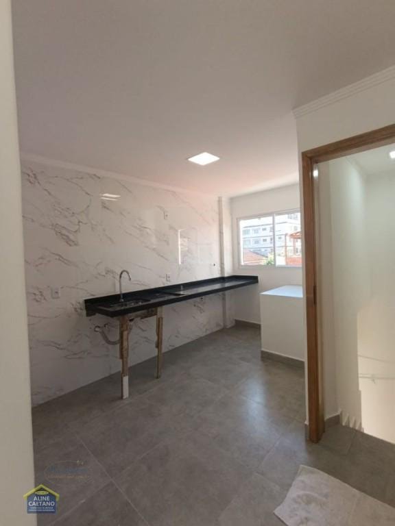 Casa à venda com 2 quartos, 1 suíte, 1 vaga e 99m² no Nova Mirim, Praia Grande (SP) — foto 14 de 30