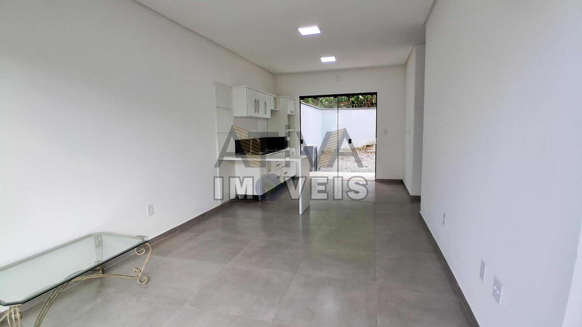 Sala estar social e cozinha