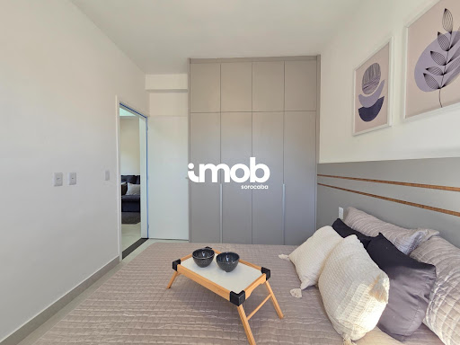 Suite ampla com cama e modulado