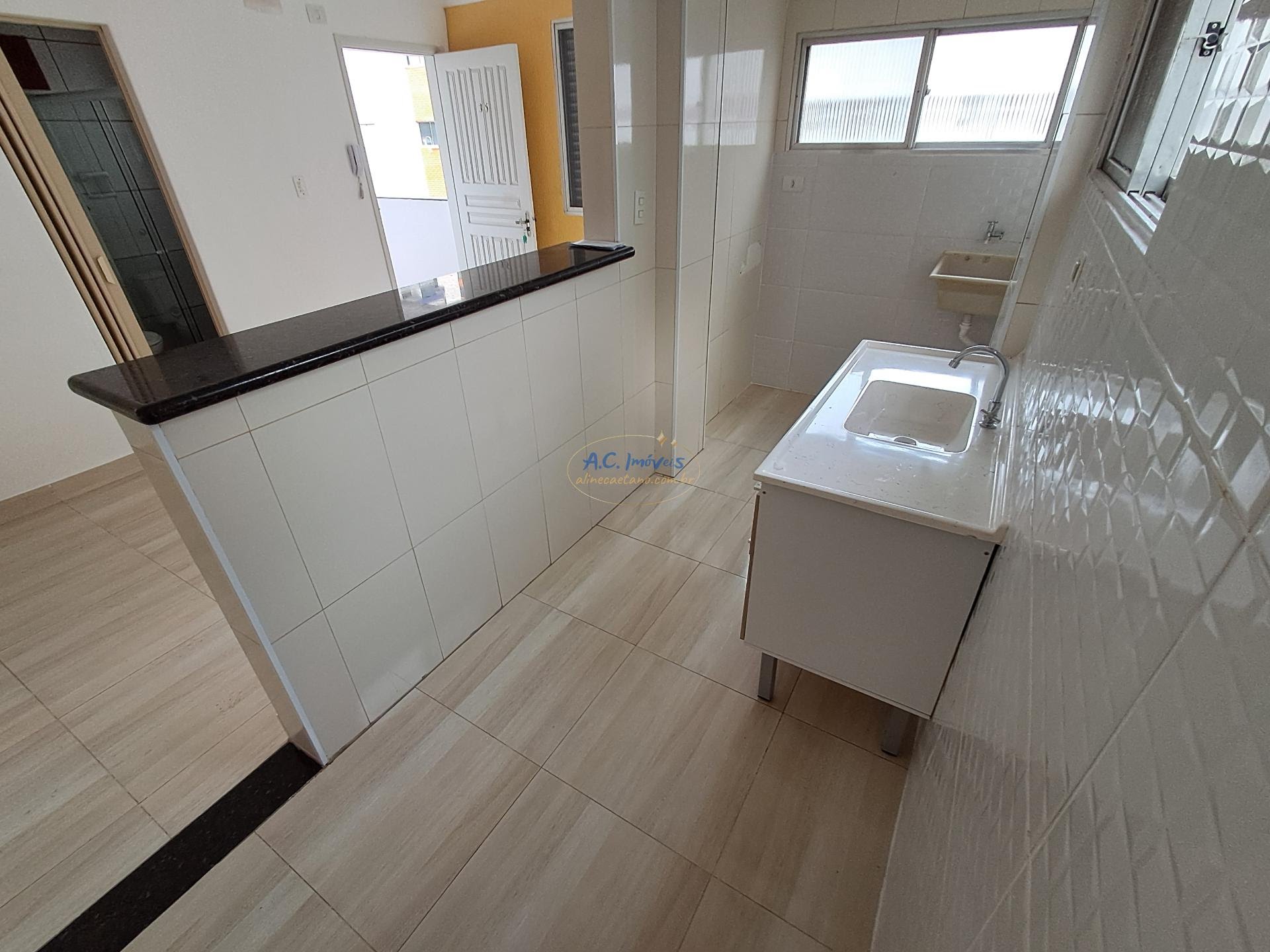 Apartamento à venda com 2 quartos, 1 suíte, 1 vaga e 50m² no Guilhermina, Praia Grande (SP) — foto 5 de 13