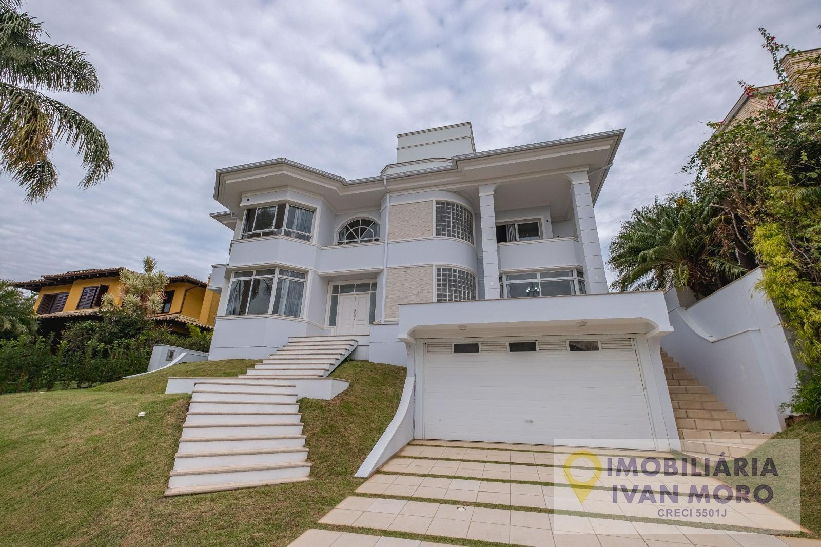 Casa à venda com 5 quartos, 7 banheiros, 4 vagas e 511m² no Cacupé, Florianópolis — foto principal