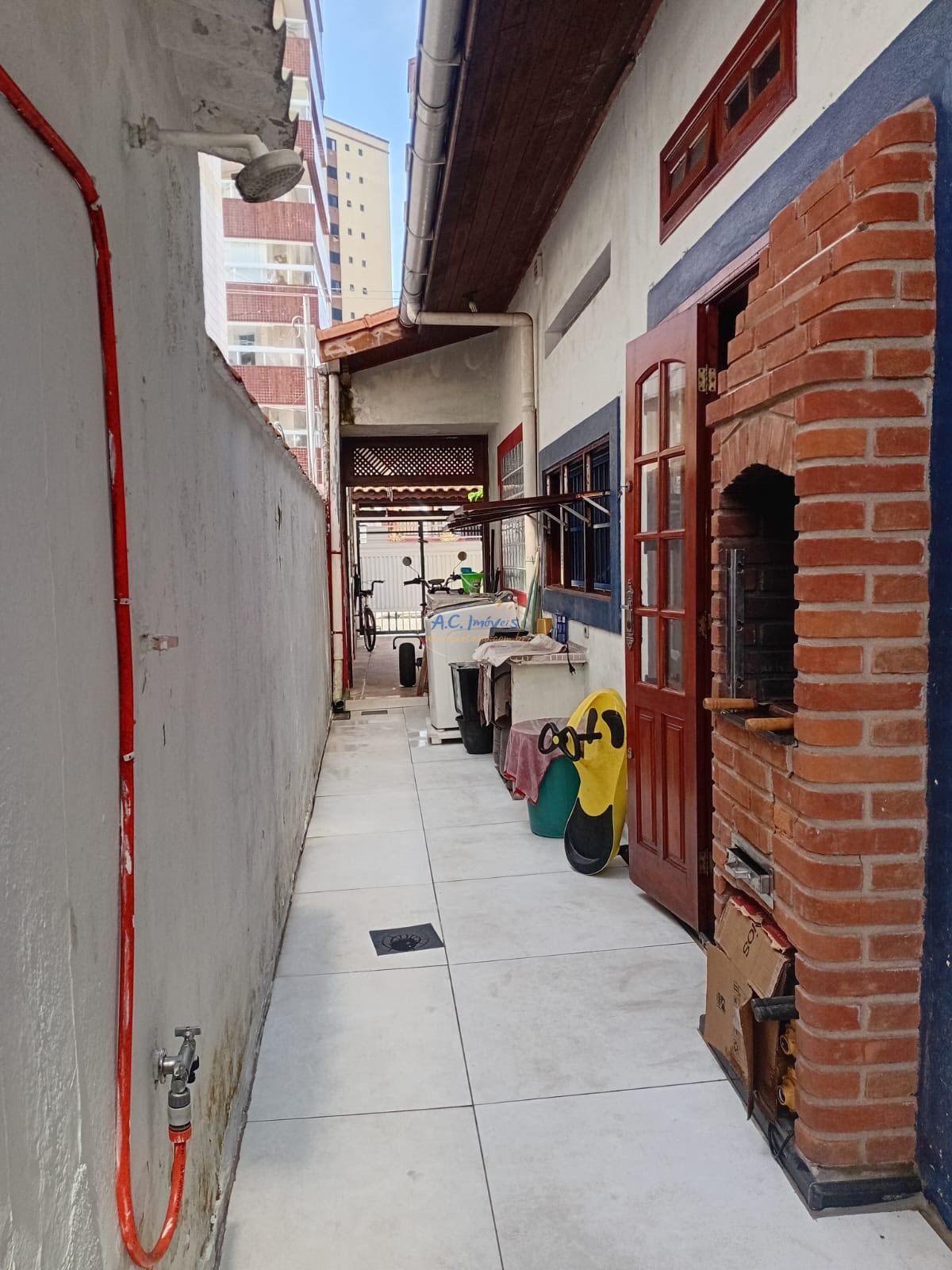 Casa à venda com 3 quartos, 1 suíte, 2 vagas e 107m² no Vila Tupi, Praia Grande (SP) — foto 21 de 24