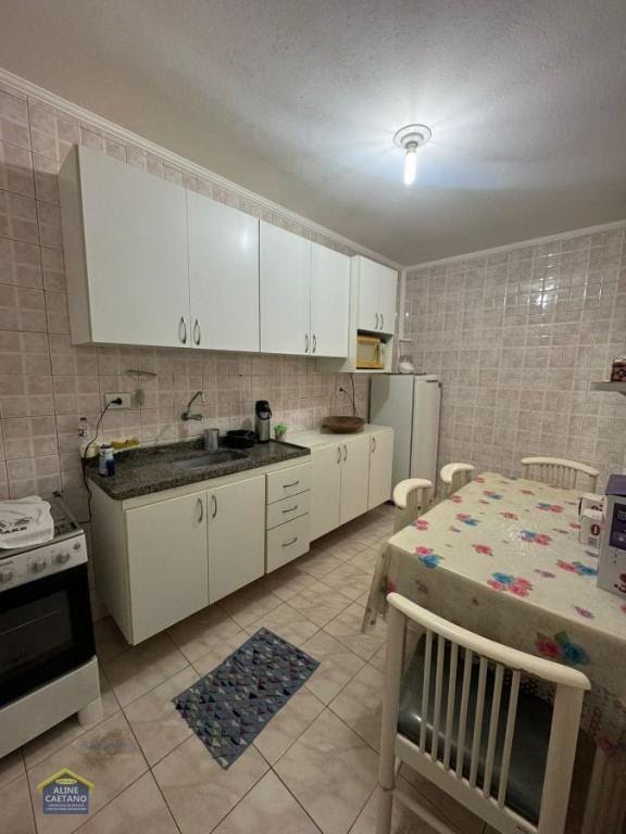 Apartamento à venda com 2 quartos, 1 banheiro, 1 vaga e 66m² no Cidade Ocian, Praia Grande (SP) — foto 5 de 12