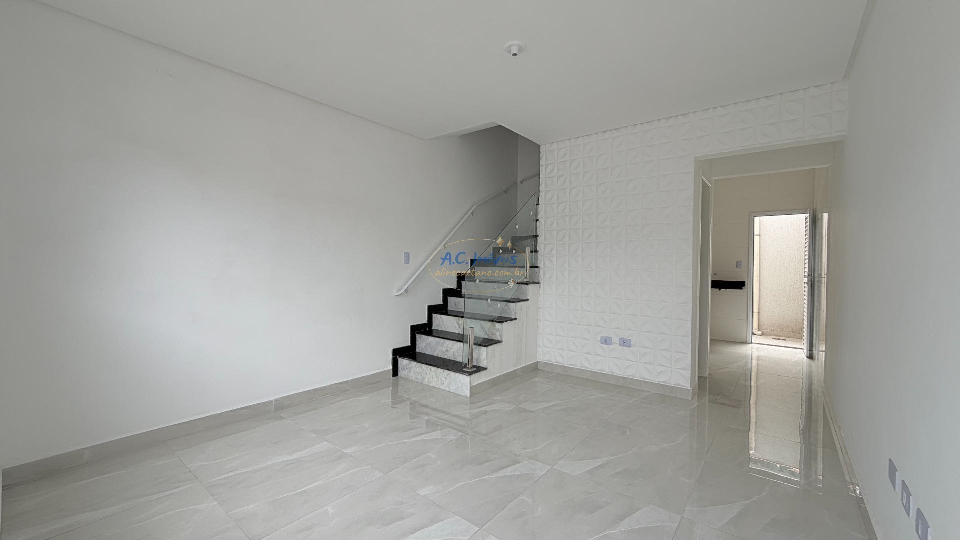 Casa à venda com 2 quartos, 2 banheiros, 1 vaga e 61m² no Quietude, Praia Grande — foto principal